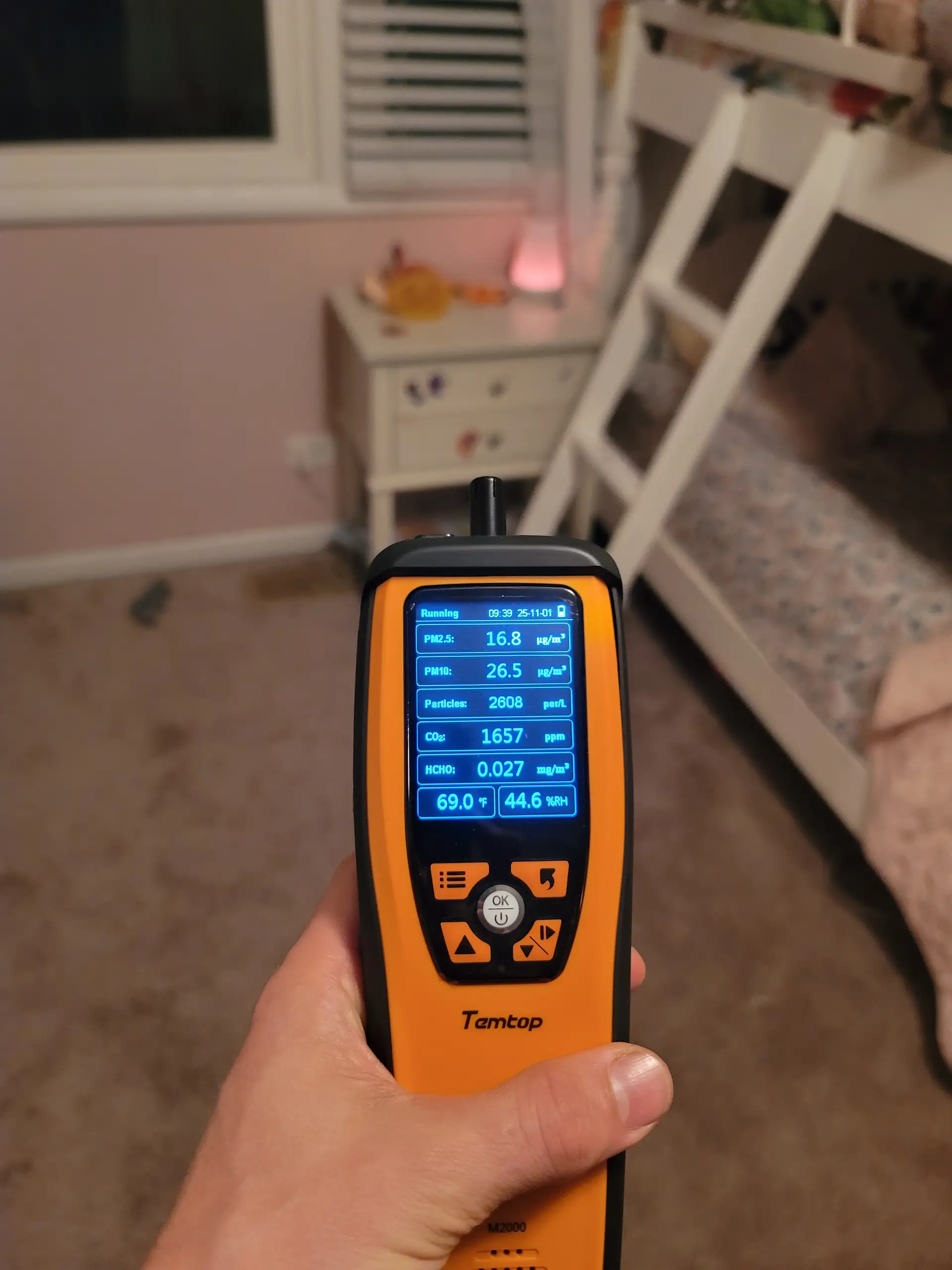 Moisture meter inspection in bedroom - detecting hidden water damage in Miami home